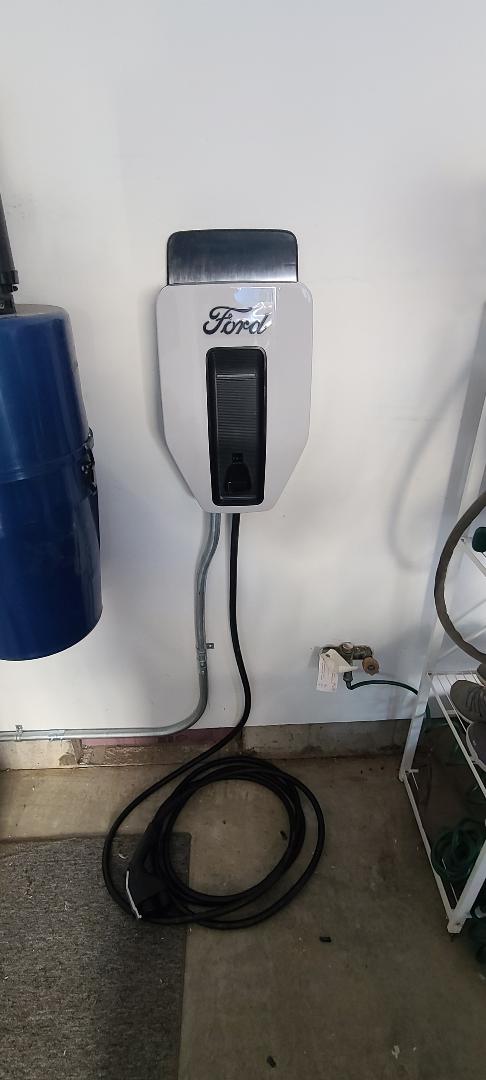 Ford-branded wall-mounted EV charging equipment